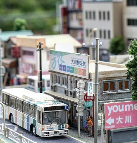 Models capture eras authentically, station architecture, advertisements, and all, preserving Japan's railway legacy (source: Pinterest).